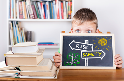 Child with Risk and Safety sign