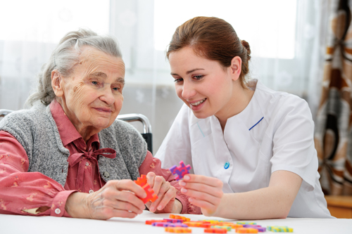 Student interacting with senior citizen