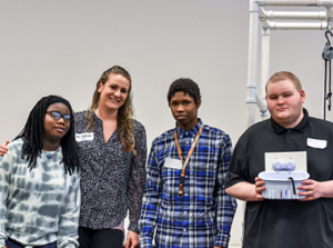 Students with teacher at STEM competition