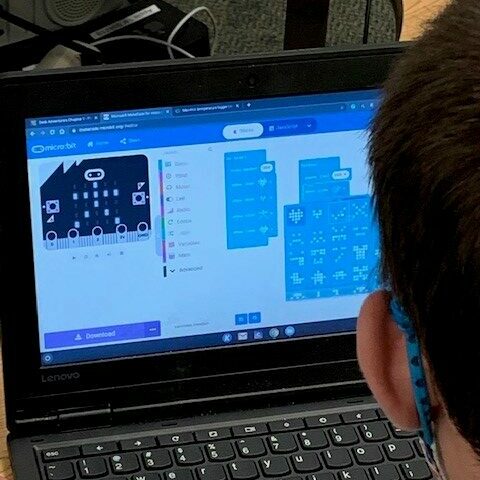 Student working on STEM project on computer