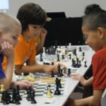 Students playing chess