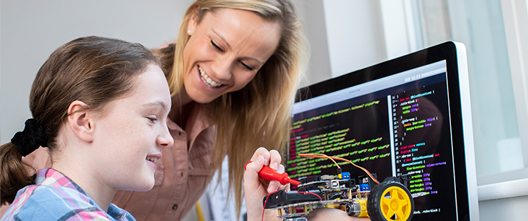 Mother with daughter working on STEM project