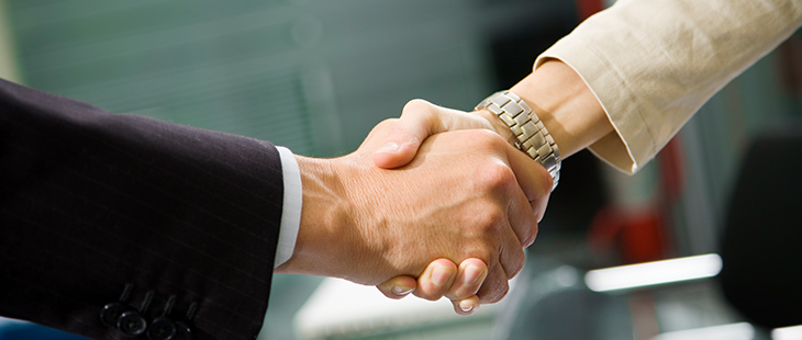 Man and woman shaking hands