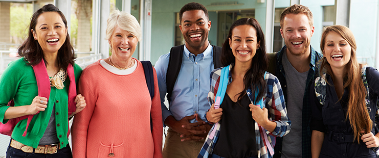 Group of educational professionals in hallway