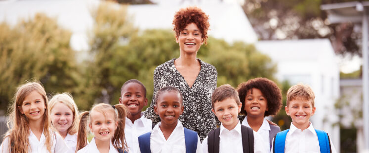 Outdoor portrait of class with teacher